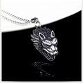 Mens vintage silver wolf head pendant necklace with rugged chain on black reflection - Wolf Head
