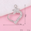 Macro detail of a 29mm silver heart crown pendant with sparkling crystal rhinestones - D731 Heart Pendant