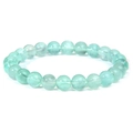 Natural light green gemstone beaded bracelet with smooth round translucent sunstone beads - Green Fluorite