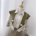 Olive green knitted shawl with beige heart patterns and lace trim on a mannequin - Knitted Pointed Heart Green