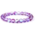 Handmade beaded bracelet featuring matte purple sunstone gems with iridescent aurora finish - Purple Synthetic Moonstone