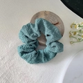 Textured bubble fabric scrunchie in elegant grey-green for minimalist hair styling - Bubble Dark Green