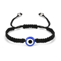 Close-up of hand-woven black cord bracelet with blue evil eye charm and silver beads - Evil Eye / Black