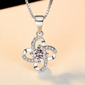 Silver pendant necklace with flower swirl design and round brilliant moissanite stone - Q018 Vortex Flower 1ct