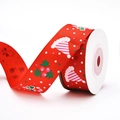 Macro detail of red Christmas ribbon with festive hat and holly leaf gold foil print - Red Ribbon with Christmas Gifts (9m)