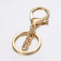 Detailed macro view of gold-plated 30mm alloy lobster clasp and metal keyring set - KC Gold (With Chain)