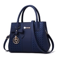 Dark blue leather handbag with woven texture, bow detail and detachable strap - Blue