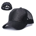 Black glitter trucker hat with mesh back and elastic criss-cross ponytail opening - Black