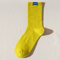 Neon yellow breathable mid-calf crew sock with ribbed cuffs and blue woven tag detail - One Size / Mustard Yellow
