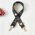 Tracolla regolabile ricamata con fiori in stile etnico e ganci in metallo dorato - Motivo Bianco e Nero / Oro