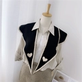 Black knitted shawl scarf with beige heart pattern and trim on a mannequin - Knitted Pointed Heart Black