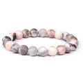 Natural sunstone stretch beaded bracelet with unique pink and grey spotted pattern - Pink Zebra Jasper