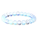 Minimalist natural moonstone beaded bracelet featuring translucent blue glow gemstones - Opalite