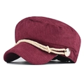 Macro shot of burgundy corduroy newsboy cap showing texture and lion gold button - Adjustable / Wine Red Corduroy