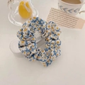 Floral organza scrunchie with yellow daisy print on blue fabric in a retro aesthetic - Pastoral Orange Flower