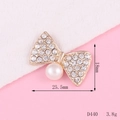 Golden bow-shaped accessory with rhinestones and pearl detail, size 25.5mm x 18mm - D440 Pearl Small Bowknot