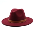 Detailed view of burgundy wide-brim felt hat with brown leather band and stitching - Burgundy