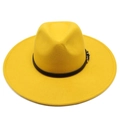 Top view of bright yellow wool fedora hat with wide brim and black leather buckle belt - Yellow