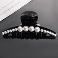 Elegant black hair claw clip with gradient pearls shown on reflective dark background - 3# Black Graduated Pearl Claw