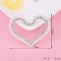 Detail view of heart-shaped pearl and rhinestone charm with 54mm by 69mm dimensions - D515 Pearl Heart