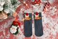 Detail of dark grey Christmas sock featuring embroidered bear with festive red scarf - One Size / Dark Grey Bear