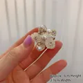 Five-petal flower hair claw clip with faux pearls and rhinestones measuring 3x3.1cm - Flower Style / Small Flower Claw Clip