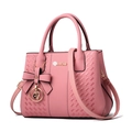 Pink synthetic leather tote bag with woven texture and bow charm pendant detail - Light Pink