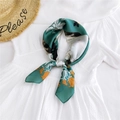 Elegant dark green satin square scarf with cat and lily print tied in a bow - Mirror Cat Green