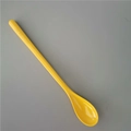 Top view of a long-handle yellow melamine spoon for dessert and milkshakes - Yellow