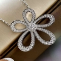 Elegant silver five-petal flower necklace with white pavé zircons on satin jewelry box - White Gold