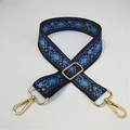 Macro detail of adjustable blue fabric strap with floral pattern and gold metal hooks - Gold Buckle / No.4 Blue Diamond