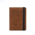 Brown leather RFID passport wallet with elastic band and airplane debossed design - Coffee
