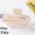 Close-up of marble-textured cream hair claw clip with elegant pearlescent finish - S118-7 Pearl Creamy White