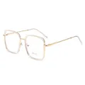 Occhiali anti-luce blu con stanghette in metallo dorato e montatura trasparente - Montatura Oro Rosa Cerchio Trasparente