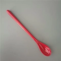 Detail of a thickened red melamine plastic spoon for milkshakes and desserts - Red