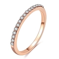 Close-up of minimalist rose gold ring featuring a half-circle of micro-pave zircons - US 7 / Rose Gold