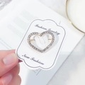 Elegant gold heart brooch with sparkling white rhinestones on jewelry card - Small Heart / Gold