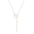 Close-up of rose gold Y-lariat necklace featuring circular ring and sleek bar pendant - Rose Gold