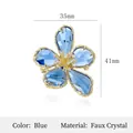 Vintage blue crystal flower brooch with gold braided edges and small diamonds - Gold Blue