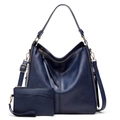 Detailed macro shot of dark blue textured leather tote bag and matching coin purse set - Two-Piece Set / Dark Blue