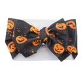 Baby headband featuring a large black bow with orange pumpkin prints on a grey ribbed band - #30 Halloween Pumpkin