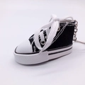 Mini black canvas sneaker keychain with white laces and durable metal keyring attachment - Black