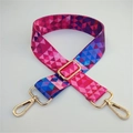 Close-up of a colorful geometric pattern bag strap with gold metal lobster clasps - Colorful Triangles