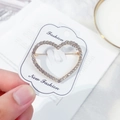 Elegant gold-tone heart-shaped brooch with clear crystals on display card - Large Heart / Gold