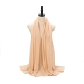 Light orange pearl chiffon hijab scarf shown on a mannequin with elegant drape - Pale Green