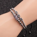 Pulsera de doble capa de cuentas plateadas con circonitas cúbicas moradas y negras - Oro Blanco