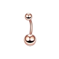 Macro shot of rose gold plated stainless steel belly ring with double spherical design - Rose Gold Ball