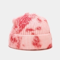Close-up of pink and red tie-dye texture on a ribbed knit beanie with cuffed design - M (56-58cm) / Stripe Red Pink Tie-Dye