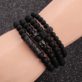 Men's 4-piece stackable beaded bracelet set with black matte beads and crown charms - Four-Piece Set / Gunmetal