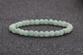 Gros plan de perles d'agate verte translucide de 6 mm sur un bracelet à un seul rang - Vert Clair (3)